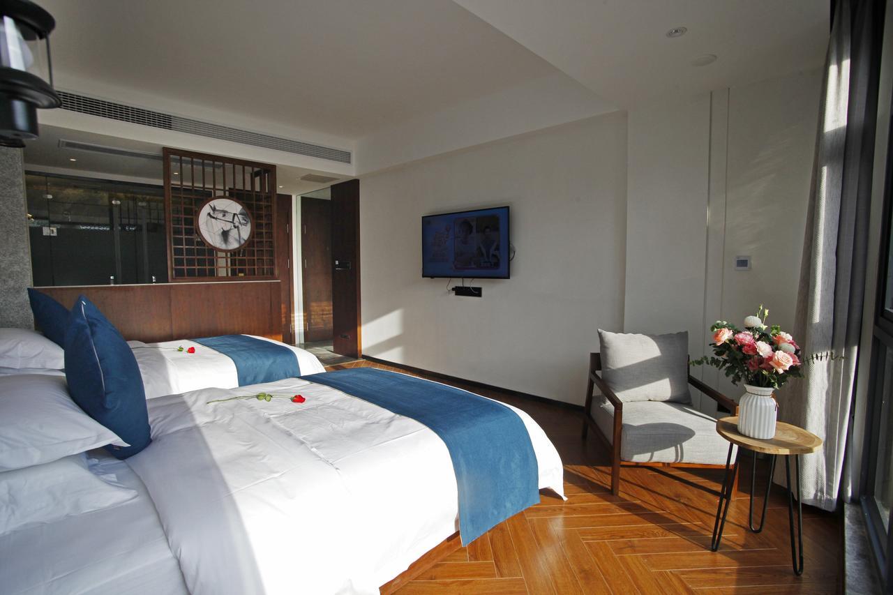 張家界武陵源北岸輕奢客棧 森林公園店 Hotel Trương Gia Giới Ngoại thất bức ảnh