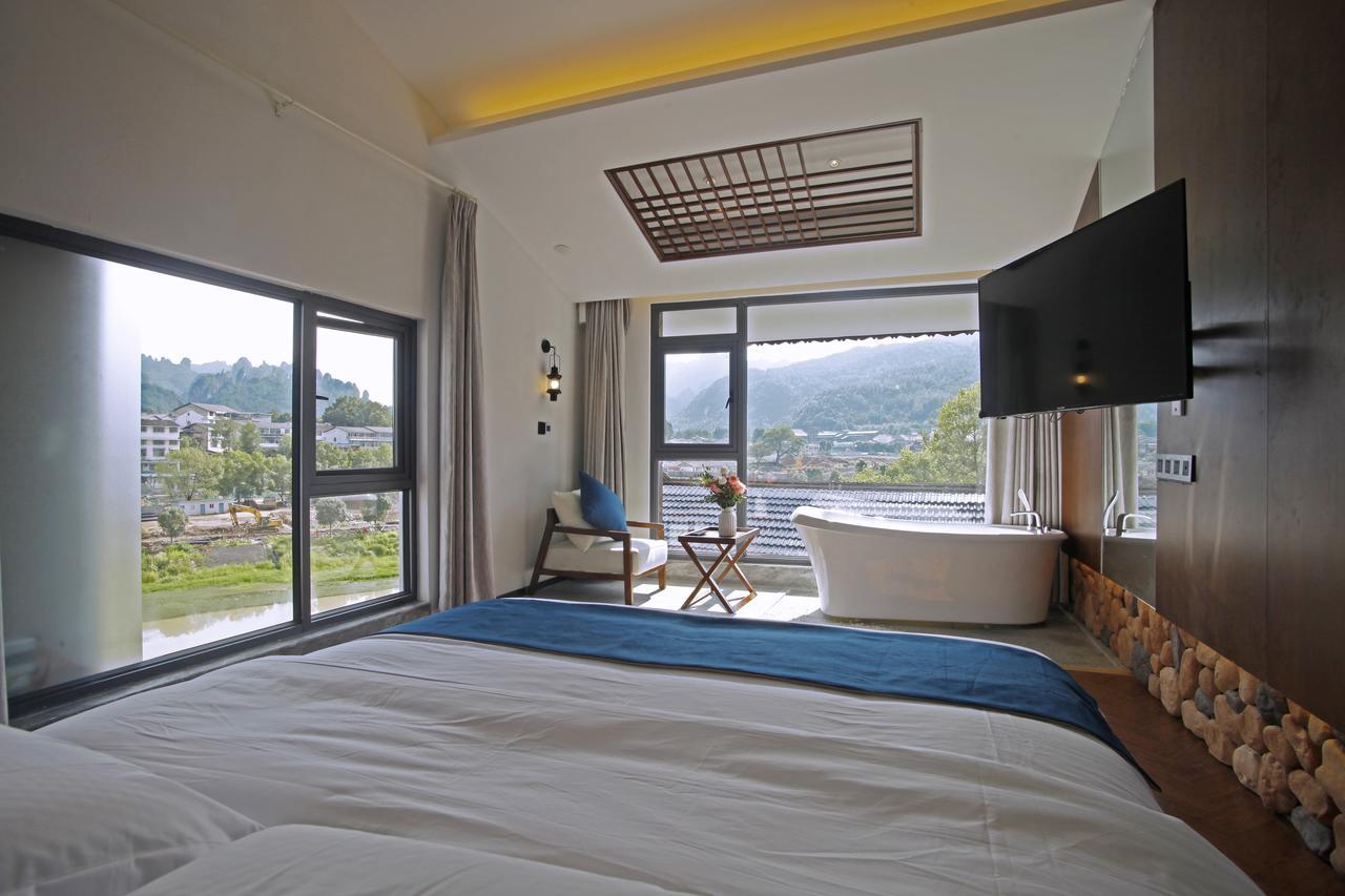 張家界武陵源北岸輕奢客棧 森林公園店 Hotel Trương Gia Giới Ngoại thất bức ảnh